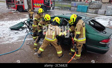Car Door crash cut fire rescue jaws of life Stock Photo - Alamy