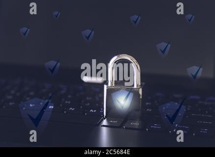 Padlock on a computer keyboard - cybersecurity concept Stock Photo
