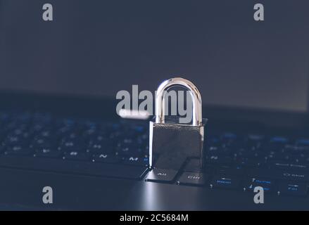 Padlock on a computer keyboard - cybersecurity concept Stock Photo