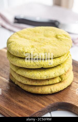 Indian pita bread on wooden cutting board. Stock Photo