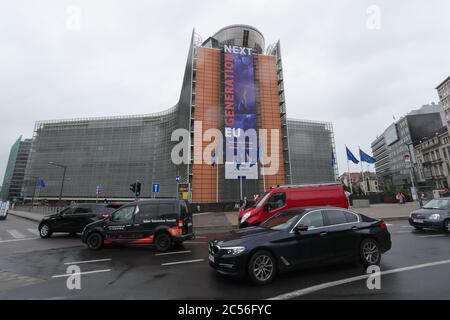 Brussels, Belgium. 30th June, 2020. Vehicles run near the headquarters of the European Commission in Brussels, Belgium, June 30, 2020. The Council of the European Union (EU) on Tuesday adopted a recommendation to lift entry restrictions for residents of some third countries starting Wednesday, and the United States is noticeably shut out. Credit: Zheng Huansong/Xinhua/Alamy Live News Stock Photo