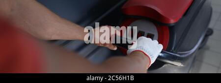Male mechanic and electric tool Stock Photo