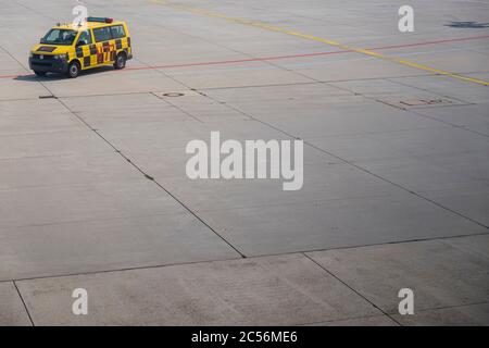 Follow-me-car on the apron at the airport Stock Photo