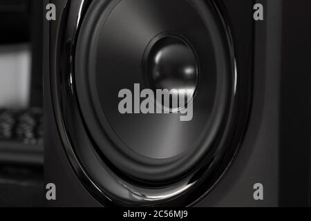 Black speaker of an acoustic monitor close-up. Stock Photo