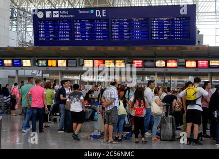 Germany, Bavaria, Munich, airport, terminal, departure, people, passengers stand in line Stock Photo
