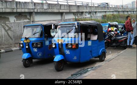 Jakarta, Indonesia - October 12, 2018: Bajaj, small motorbike taxi, at Tanah Abang District, Central Jakarta Stock Photo