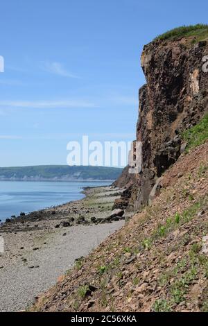 Rocky coastline of Nova Scotia, Canada under the blue sky Stock Photo