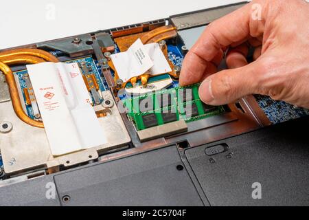 Adding ram to a laptop Stock Photo