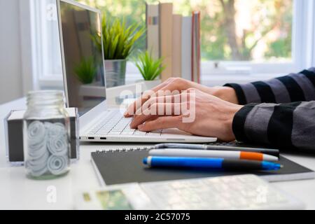 Student using laptop computer for study Stock Photo