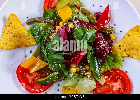 Vegetables salad with avocado and corn Stock Photo