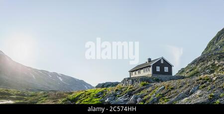 Mountain hut on Geirangerstrasse in Norway Stock Photo