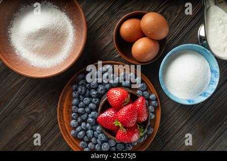 recipe and making american pie with strawberries and blueberries. top view Stock Photo