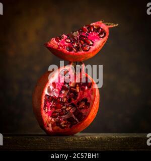 Close-up halved pomegranate Stock Photo