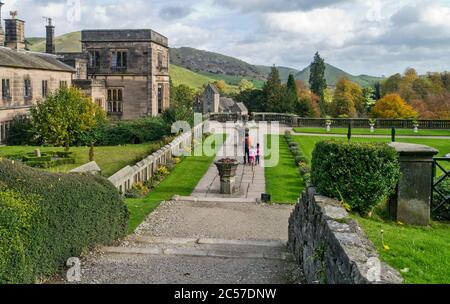 Ilam Hall, a 19th century country house now occupied by the Youth Hostel Association, Staffordshire, UK; viewed from the Italianate gardens Stock Photo