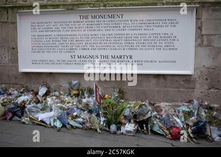 Memorial to the London Bridge terror attack of November 2019 on 7th January 2020 in London, England, United Kingdom. Floral tributes to those who lost their lives were placed at the foor of Monument in remembrance. Stock Photo