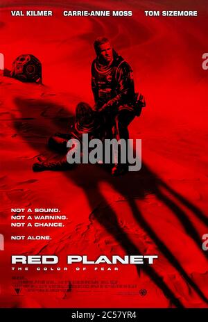 Red Planet (2000) directed by Antony Hoffman and starring Val Kilmer, Carrie-Anne Moss, Tom Sizemore and Terence Stamp. In 2056 astronauts search Mars for solutions to save a dying planet Earth but find unfriendly Martians. Stock Photo