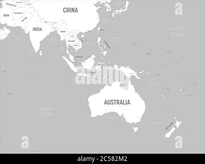 Australia and Southeast Asia map - white lands and grey water. High detailed political map of australian and southeastern Asia region with country, capital, ocean and sea names labeling. Stock Vector