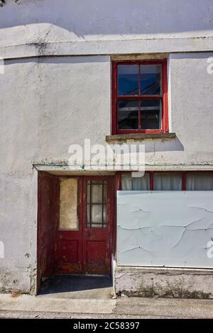 Old partly boarded up shop in Malew Street, Castletown, Isle of Man Stock Photo