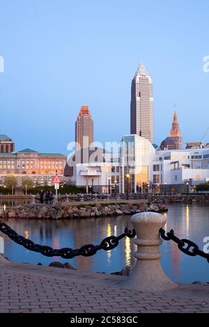 Cleveland, Ohio, United States of America - Great Lakes Science Center building and skyline of downtown at dusk. Stock Photo