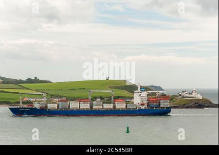 Weavers Point, West Cork, Ireland. 1st July, 2020. On an overcast but warm and humid day, container ship 'Maersk Niagra', sails past Roches Point at the entrance to the Port of Cork. The ship is carrying Ireland's weekly supply of bananas into Ringaskiddy Deep Water Berth. Credit: AG News/Alamy Live News Stock Photo