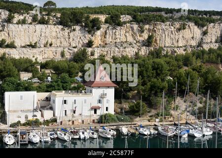 Capitainerie in Historic Chateau, Yacht Club & Moored Yachts in Calanque de Port-Miou Calanques National Park Cassis Provence France Stock Photo