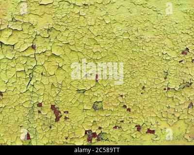 Rusty metal panel with cracked yellow paint, corroded grunge metal background texture Stock Photo