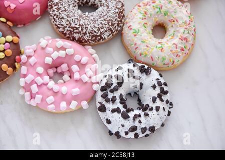 Donut with colorful sprinkles. Top view Stock Photo