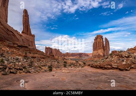 Stunning view of The Organ sandstone structure in the distance seen from the Park Avenue Trail, Arches National Park, Moab, Utah Stock Photo