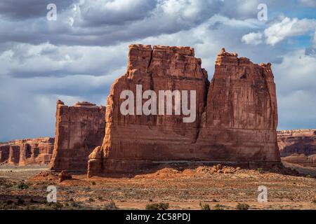 Beautiful view of The Organ sandstone rock structure with Tower of Babel behind it, seen along Arches Scenic Drive, Arches National Park, Moab, Utah Stock Photo
