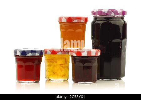 glass jars with assorted  jam and marmalade with room for your label, text or images on a white background Stock Photo