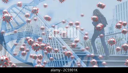 Covid-19 cells and DNA structure against woman walking up the stairs Stock Photo