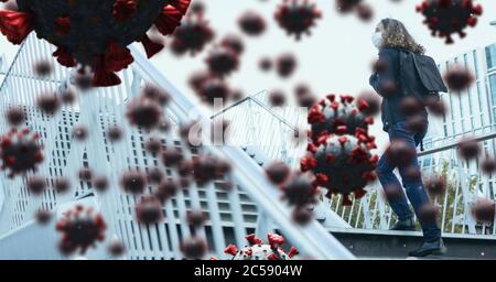 Covid-19 cells against woman walking up the stairs Stock Photo