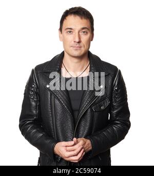 Handsome man in a black leather jacket isolated on white Stock Photo