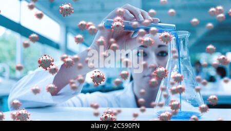 Covid-19 cells against female scientist pouring chemical in laboratory Stock Photo