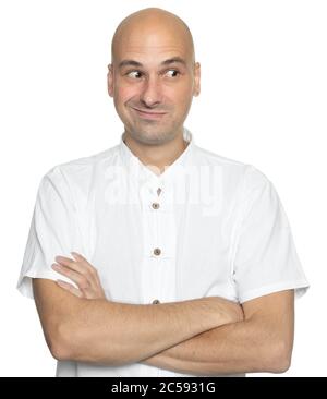 Portrait of happy fashionable bald handsome man in white shirt crossing hands and look aside. Isolated Stock Photo