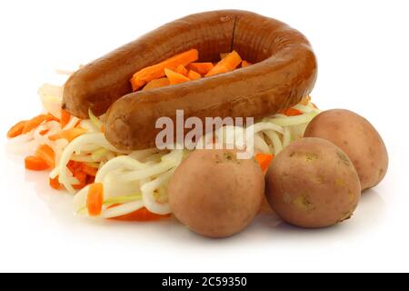 ingredients for making the traditional Dutch meal called 'Hutspot' on a white background Stock Photo