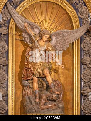 BARCELONA, SPAIN - MARCH 3, 2020: The baroque polychome carved satatue of Michael archangel in church Basilica de la Merced. Stock Photo