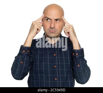 Serious bald man thinking about a problem. Middle aged guy with headache looking aside. Isolated Stock Photo
