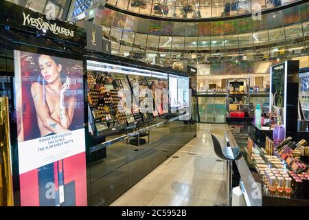 BERLIN, GERMANY - CIRCA SEPTEMBER, 2019: assorted Yves Saint Laurent make-up products on display at Galeries Lafayette in Berlin. Stock Photo