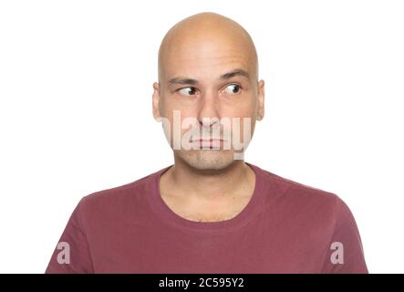 Bald 40 years man is looking aside. Isolated on white Stock Photo