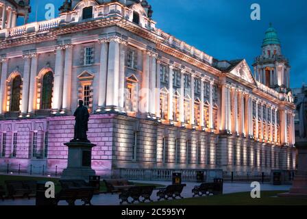 Town Hall in Belfast lighted during the night Stock Photo