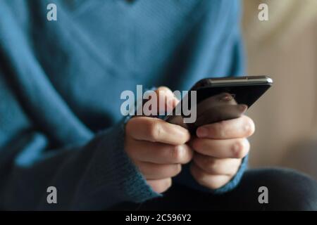 Woman using smartphone Stock Photo