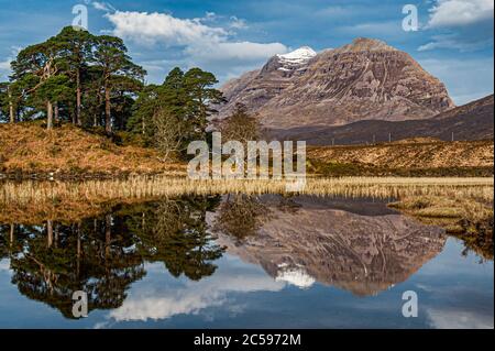 A panorama of Loch Clair with the views of  Liathach from across the water. Glen Torridon, Highlands of Scotland. Stock Photo