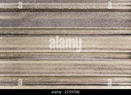 The texture of heat insulation stuck under the metal sheet roof Stock Photo