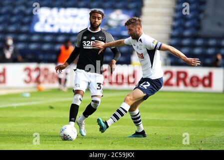 Derby County's Jayden Bogle (left) and Preston North End's Paul Gallagher battle for the ball during the Sky Bet Championship match at Deepdale, Preston. Stock Photo