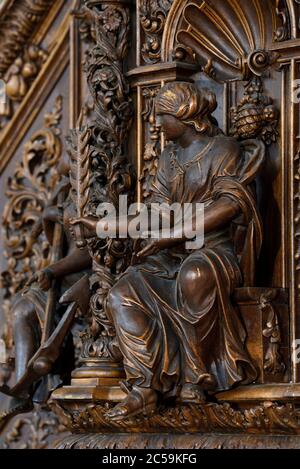 France, Haute Saone, Fresse, Saint Antide church dated 18th century, tribune of the Lucelle abbey dated 17th century, recovered after the French Revolution, statue of Faith Stock Photo