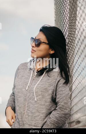 portrait of beautiful hispanic woman wearing sportswear Stock Photo