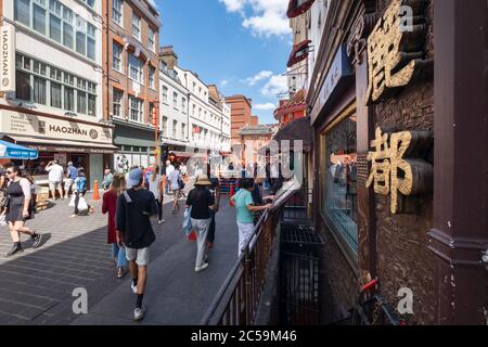 Street scene on a sunny day at Chinatown in London Stock Photo