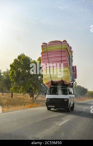 Africa, West Africa, Burkina Faso, Tenkodogo. A fully loaded truck on the road east of Burkina Faso. Stock Photo