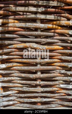 Hand made wooden wicker fence, texture, background Stock Photo